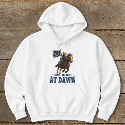 White hoodie with a graphic of a cat on a horse holding a Colts flag, reading "We Ride At Dawn."
