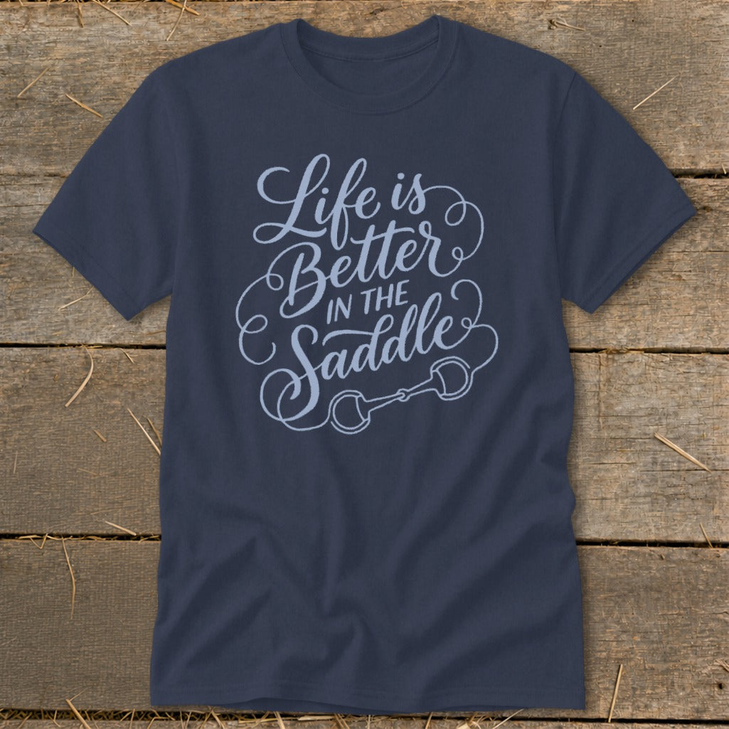 Navy t-shirt with "Life is Better IN THE Saddle" text and horse bit graphic.