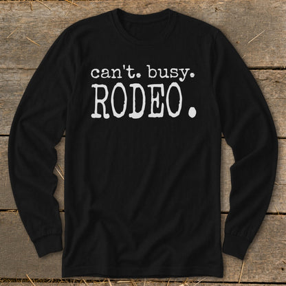 Black long-sleeve shirt with "can't. busy. RODEO." text.