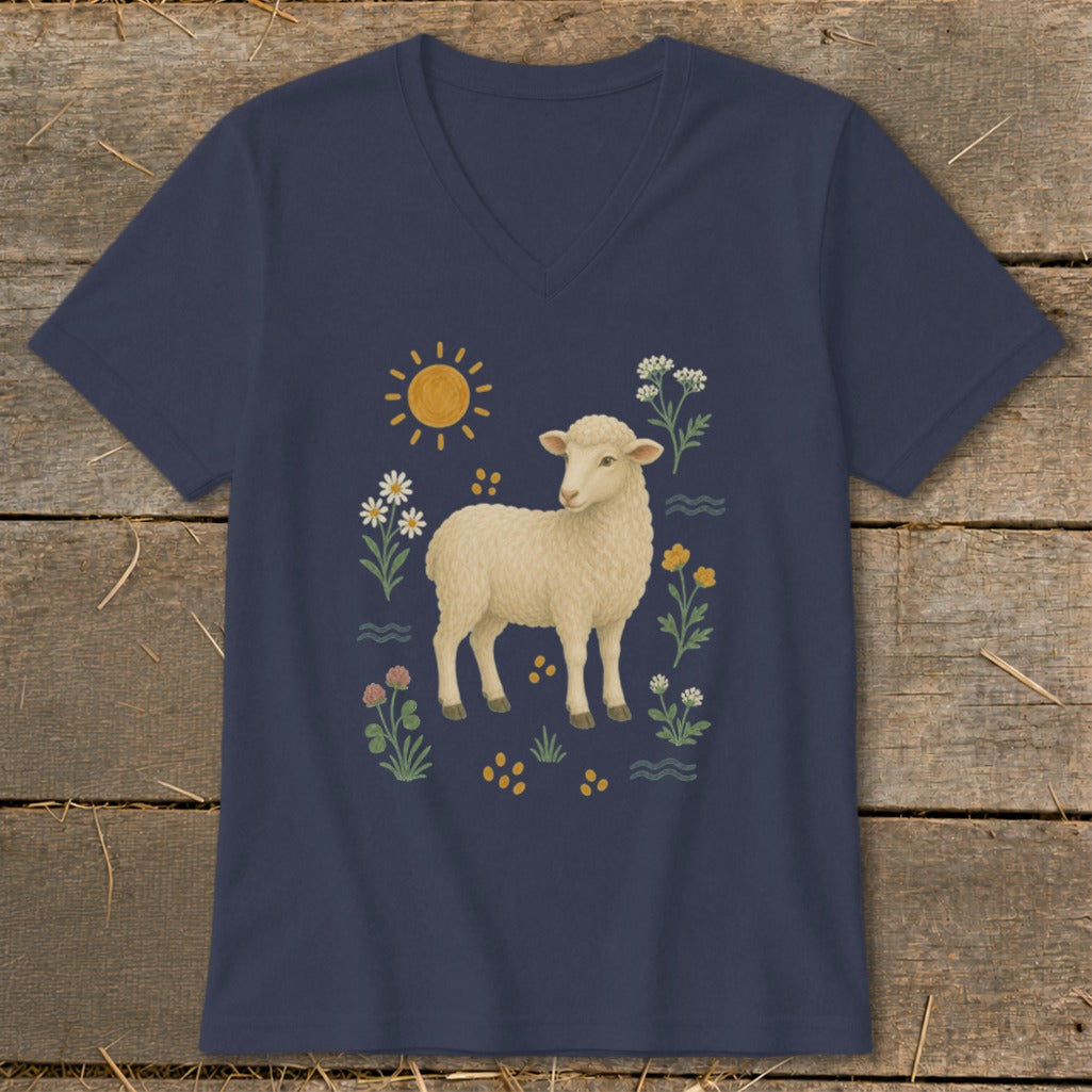Navy v-neck t-shirt with a stylized illustration of a sheep surrounded by flowers and a sun.