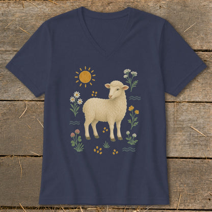 Navy v-neck t-shirt with a stylized illustration of a sheep surrounded by flowers and a sun.