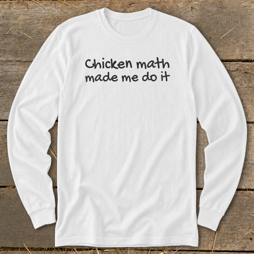 White long-sleeved shirt with "Chicken math made me do it" printed in black text.