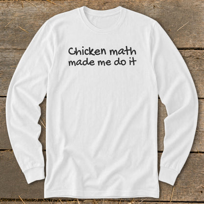 White long-sleeved shirt with "Chicken math made me do it" printed in black text.