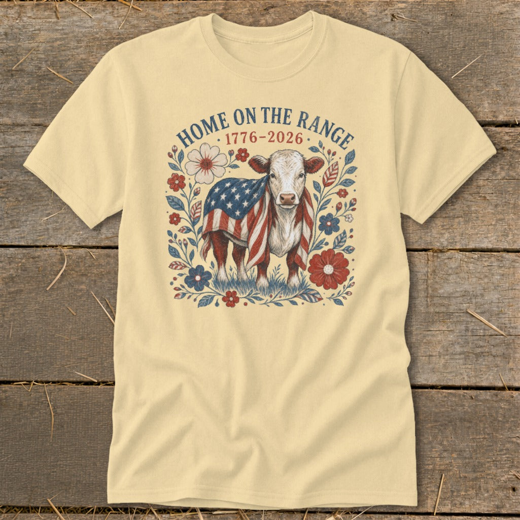 Cow wearing American flag blanket with text "HOME ON THE RANGE 1776-2026".
