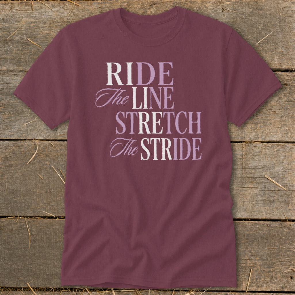 Maroon t-shirt with text "RIDE The LINE STRETCH The STRIDE".