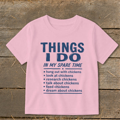 Pink t-shirt with "THINGS I DO IN MY SPARE TIME" and chicken-related list.