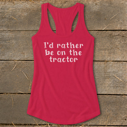 Pink racerback tank top with white text that reads "I'd rather be on the tractor."