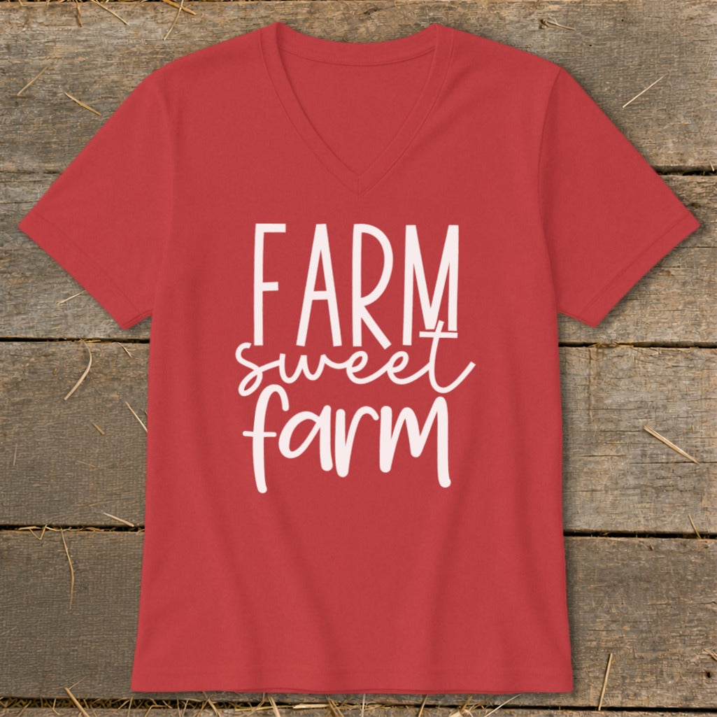 Red v-neck t-shirt with "Farm sweet farm" text graphic.