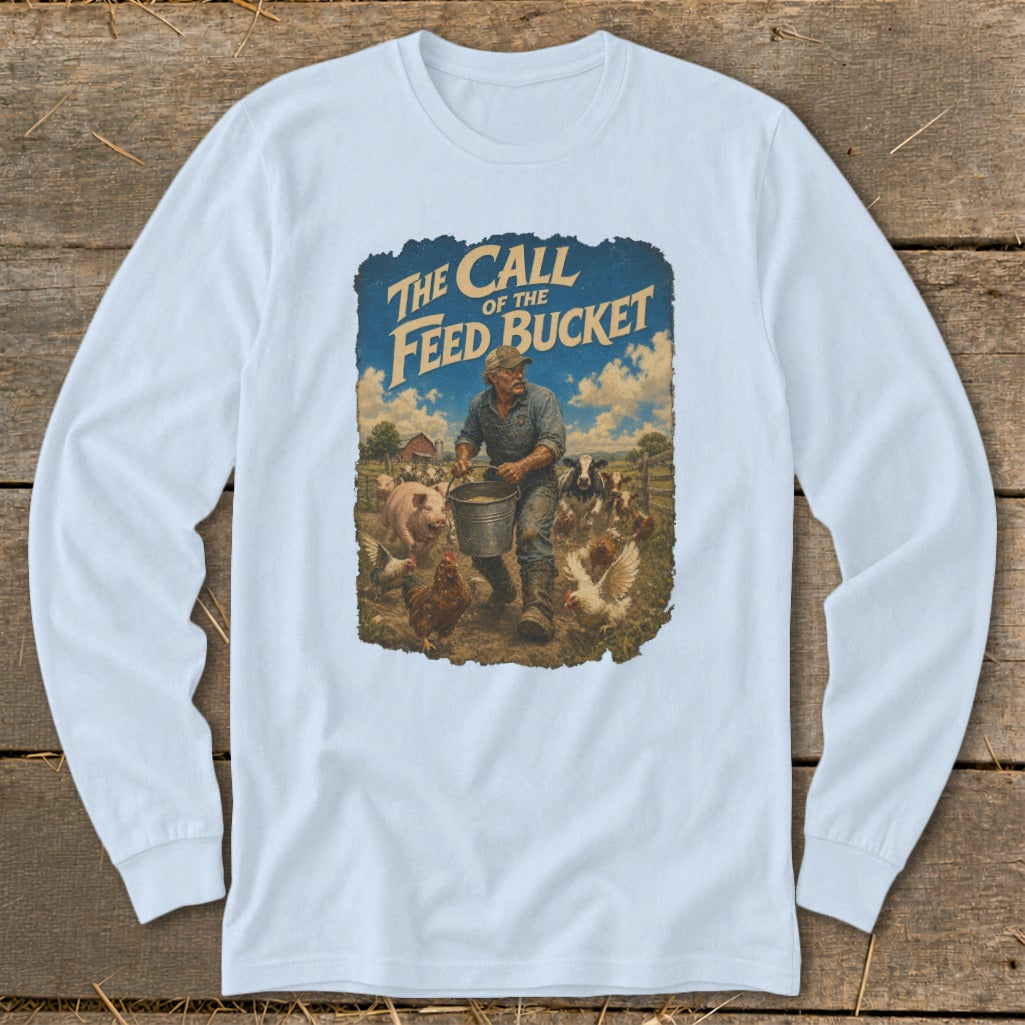 Long-sleeve shirt with farmer feeding livestock, text "The Call of the Feed Bucket."