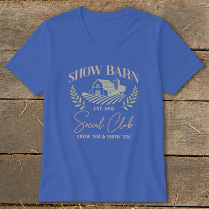 Blue v-neck t-shirt with "Show Barn Social Club" text and barn graphic.