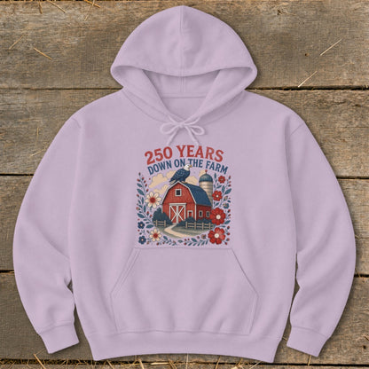 Lavender hoodie with a red barn, silo, and flowers design. Text reads "250 YEARS DOWN ON THE FARM."