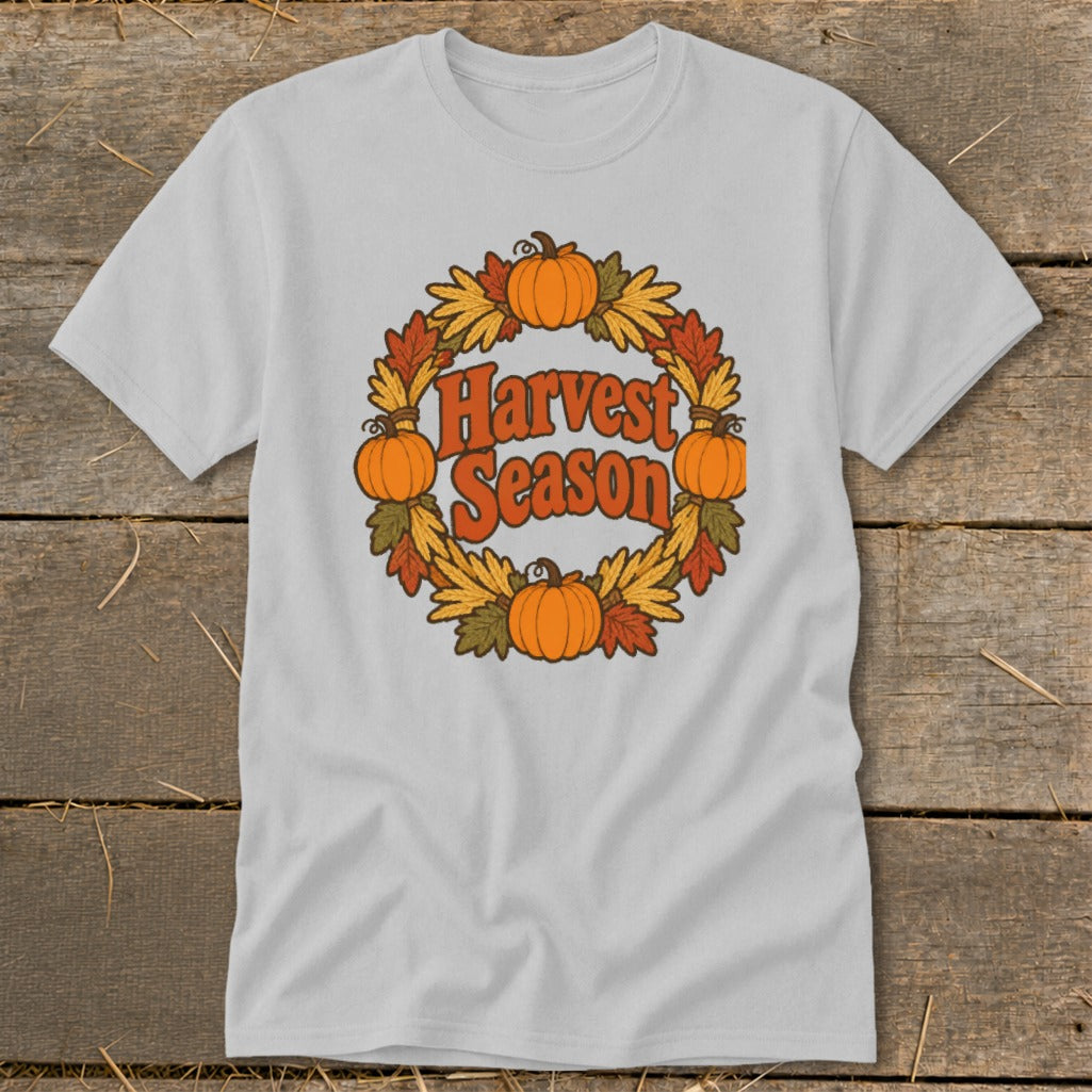 Light grey t-shirt with a circular graphic of pumpkins and autumn leaves, reading "Harvest Season".