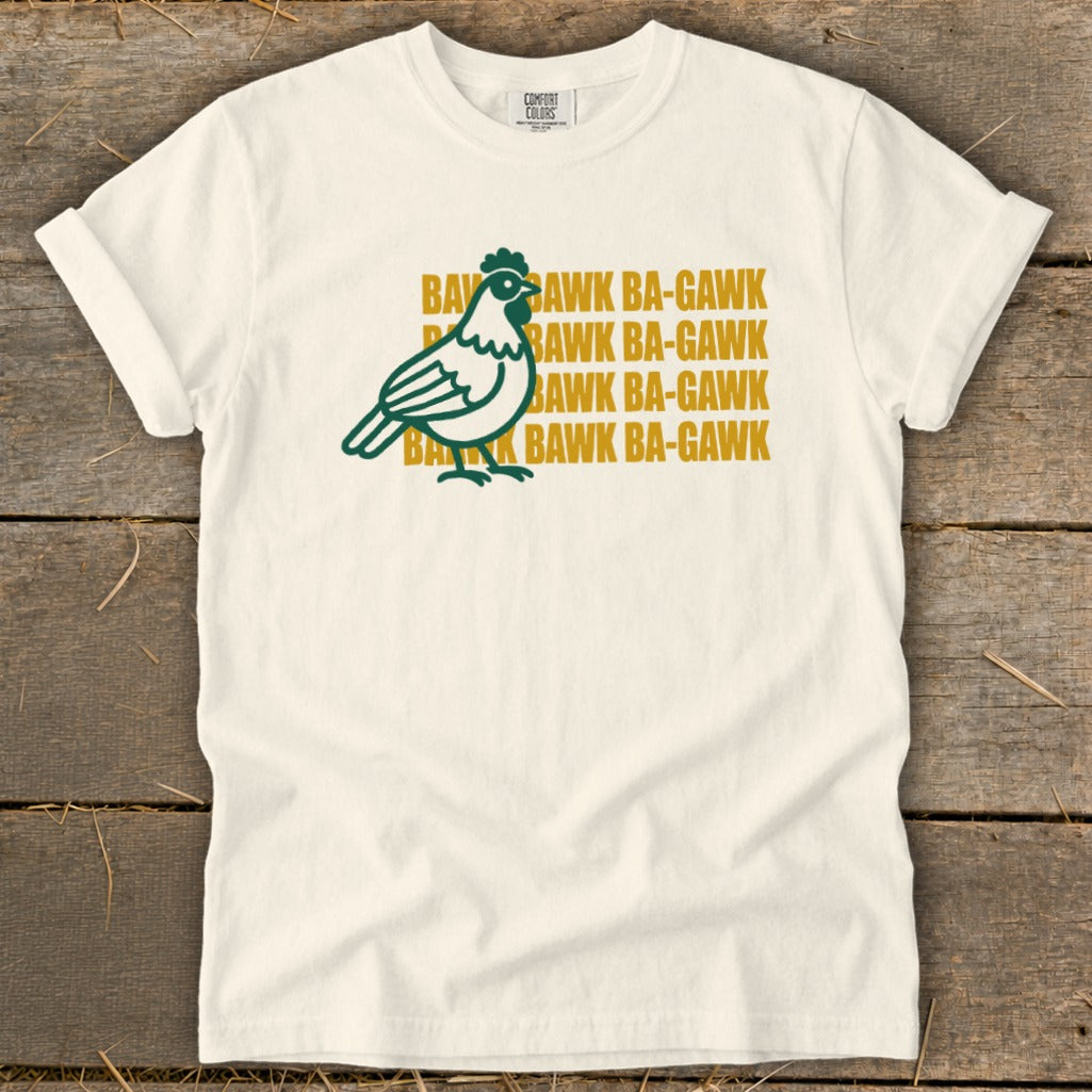 White t-shirt with a green chicken graphic and "Bawk Ba-Gawk" text.