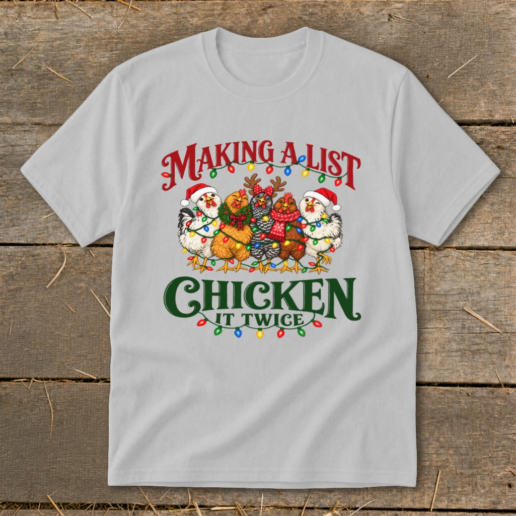 Five chickens in Santa hats and scarves with Christmas lights. Text: Making a list, chicken it twice.