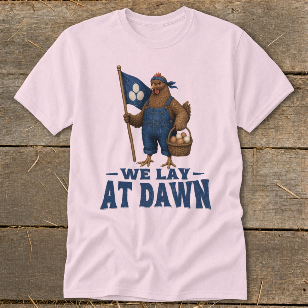 Chicken in overalls holding a flag and basket of eggs, text reads "We Lay At Dawn".
