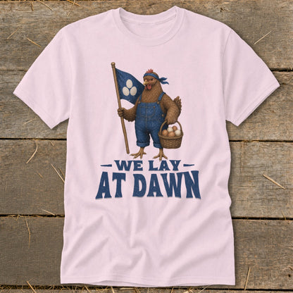 Chicken in overalls holding a flag and basket of eggs, text reads "We Lay At Dawn".