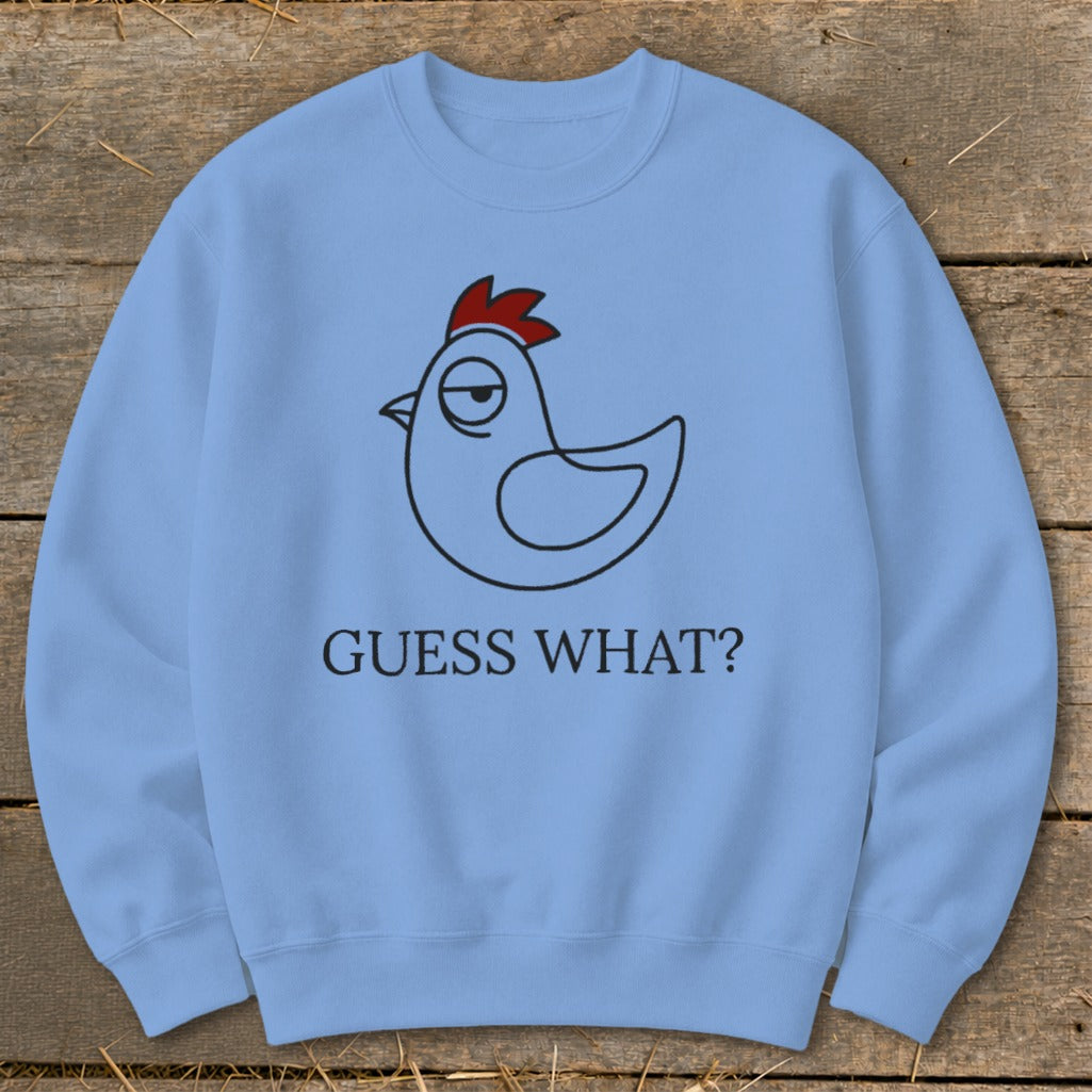 Light blue crewneck sweatshirt with a cartoon chicken design and "Guess What?" text.