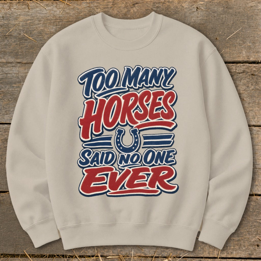 Light tan sweatshirt with "Too Many Horses Said No One Ever" text and horseshoe graphic.