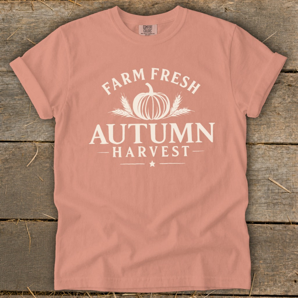 Peach t-shirt with "Farm Fresh Autumn Harvest" graphic and pumpkin design.