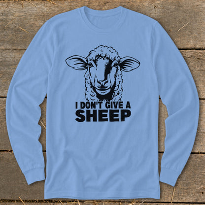 Light blue long-sleeve shirt with a black sheep graphic and text "I DON'T GIVE A SHEEP".