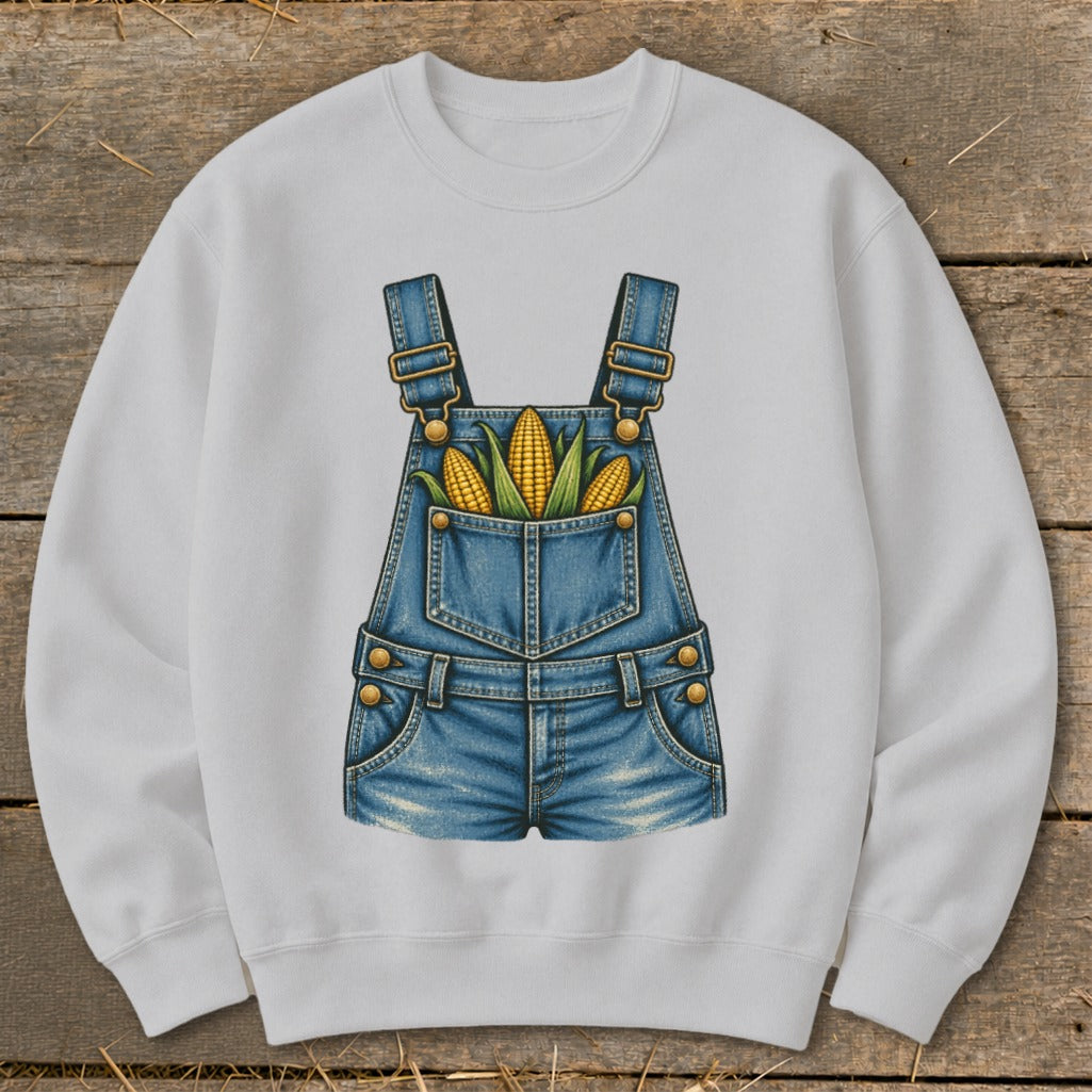 Sweatshirt with a denim overalls graphic filled with corn ears and leaves.
