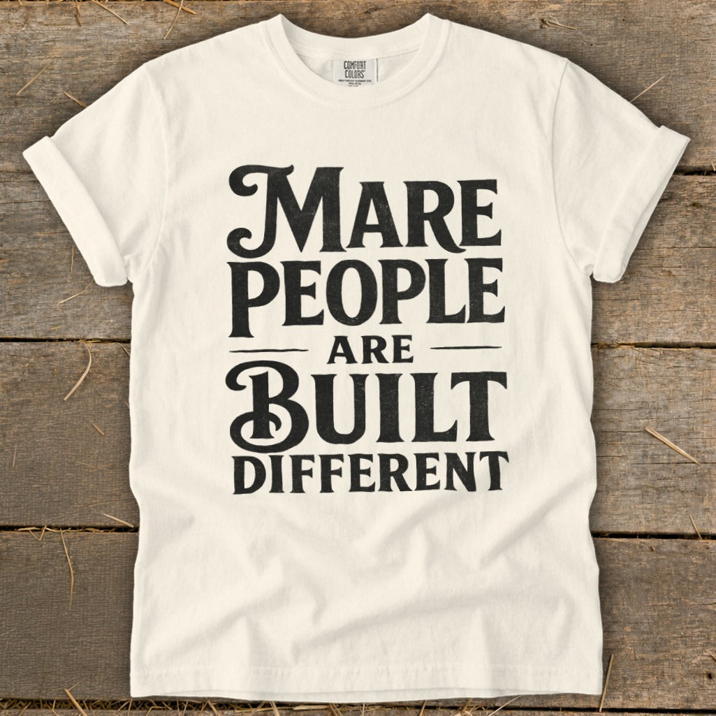 White t-shirt with black text reading "Mare People Are Built Different".