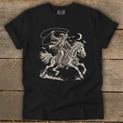 Black t-shirt with skeleton cowboy riding a skeleton horse, lassoing under a crescent moon.
