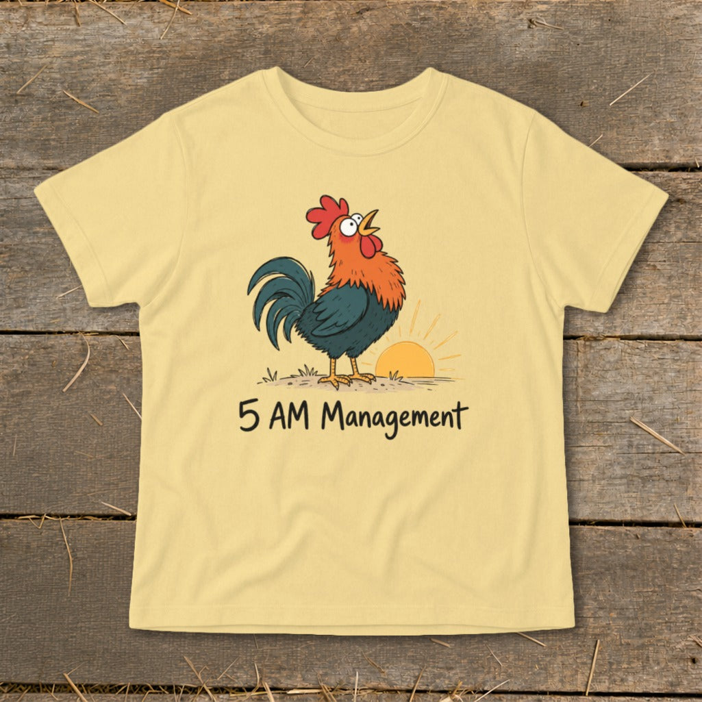 Yellow t-shirt with cartoon rooster and sunrise graphic and "5 AM Management" text.