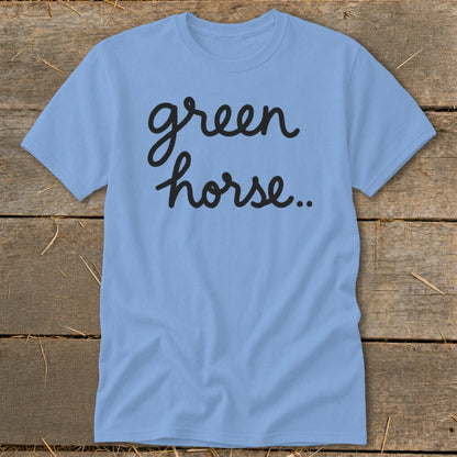 Light blue t-shirt with black cursive text "green horse.."
