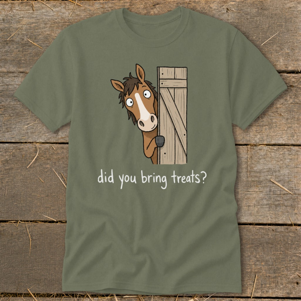 Olive green t-shirt with cartoon horse peeking from wooden door saying "did you bring treats?"