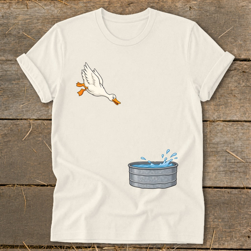 White t-shirt with cartoon duck jumping into a galvanized tub of water.