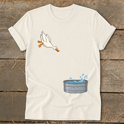 White t-shirt with cartoon duck jumping into a galvanized tub of water.