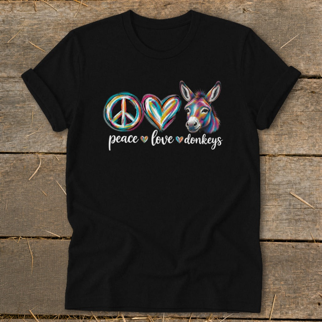 Black t-shirt with "peace love donkeys" text and graphics of a peace sign, heart, and donkey.
