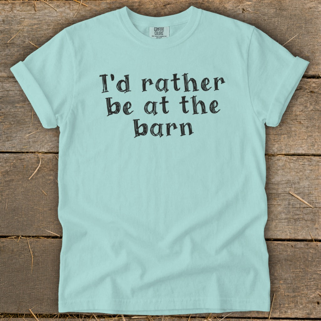 Light blue t-shirt with black text: "I'd rather be at the barn."