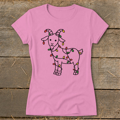 Pink t-shirt with a black outline drawing of a goat wrapped in Christmas lights.