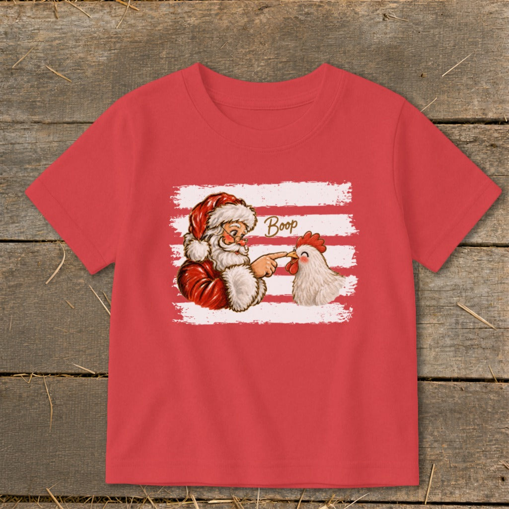 Santa booping a chicken with the word "Boop" written nearby.