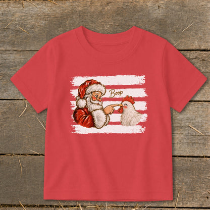 Santa booping a chicken with the word "Boop" written nearby.