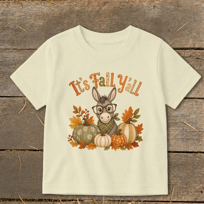 Light yellow t-shirt with cartoon donkey, pumpkins, and "It's Fall Y'all" text.
