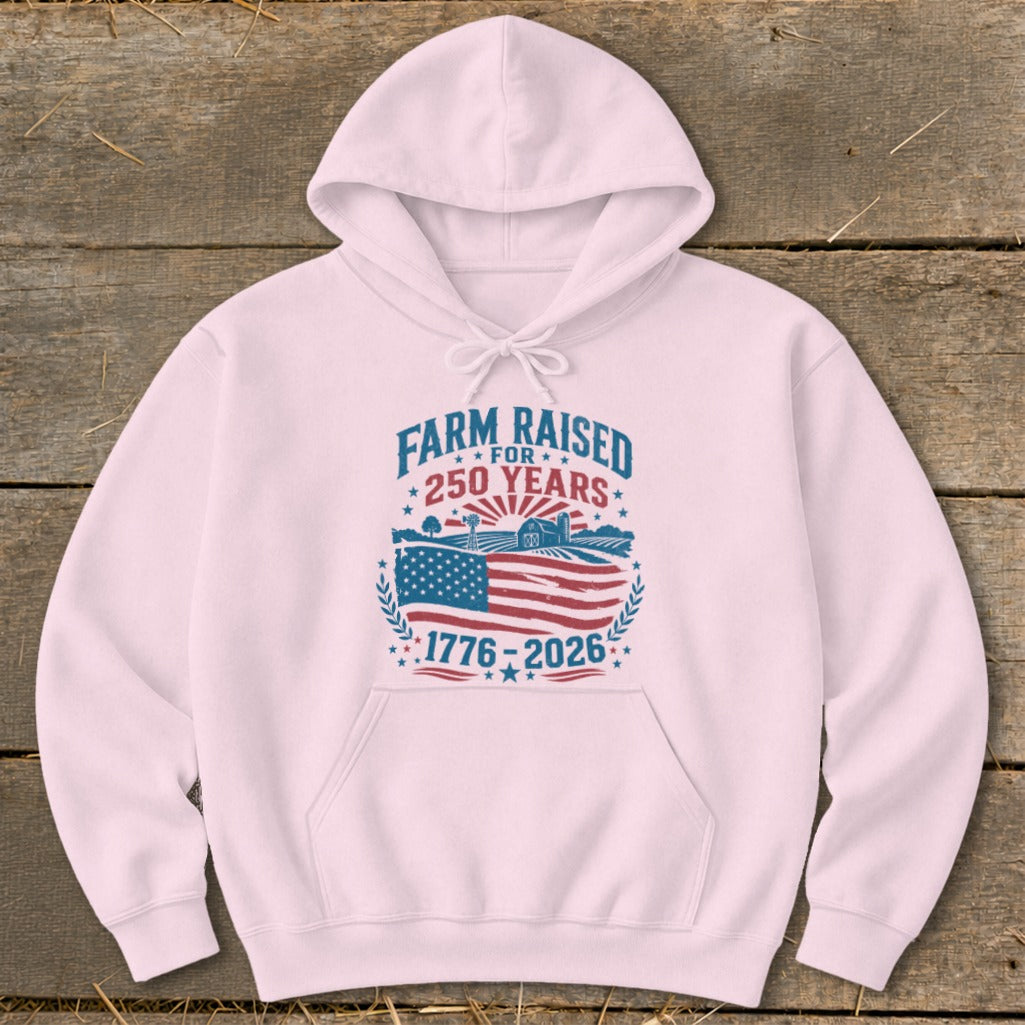 Pink hoodie with "Farm Raised for 250 Years" and US flag graphic.