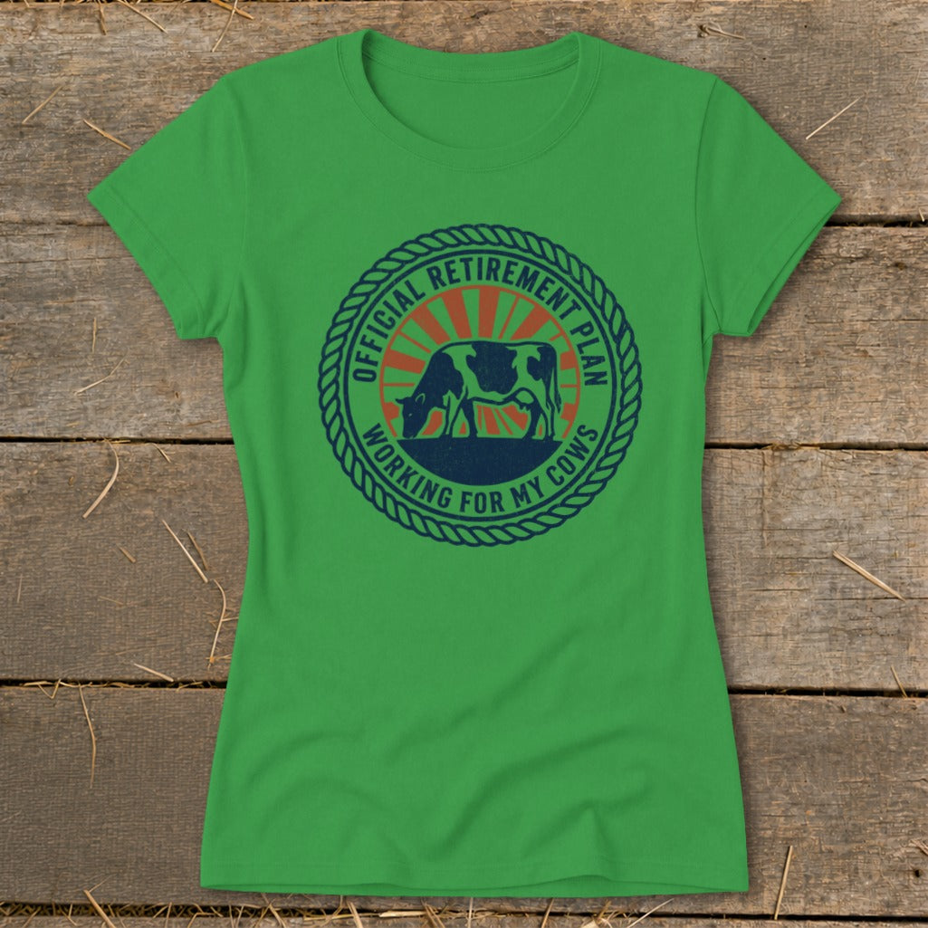 Green t-shirt with "Official Retirement Plan Working For My Cows" circular graphic.