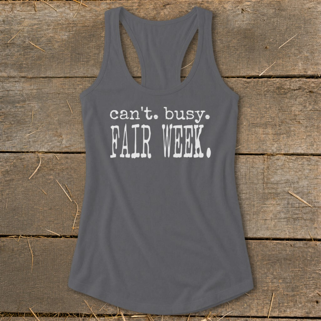 Gray racerback tank top with white text reading "can't. busy. FAIR WEEK."