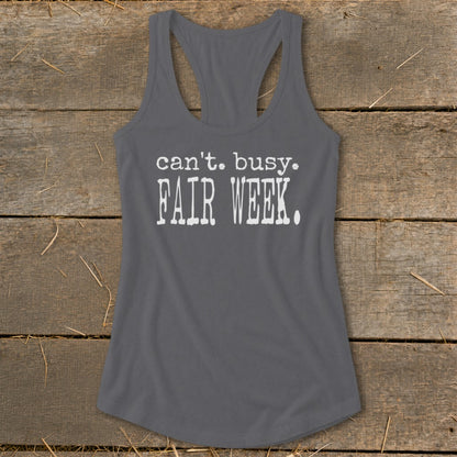 Gray racerback tank top with white text reading "can't. busy. FAIR WEEK."