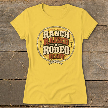 Yellow t-shirt with "Ranch Raised Rodeo Ready" text in a rope circle.