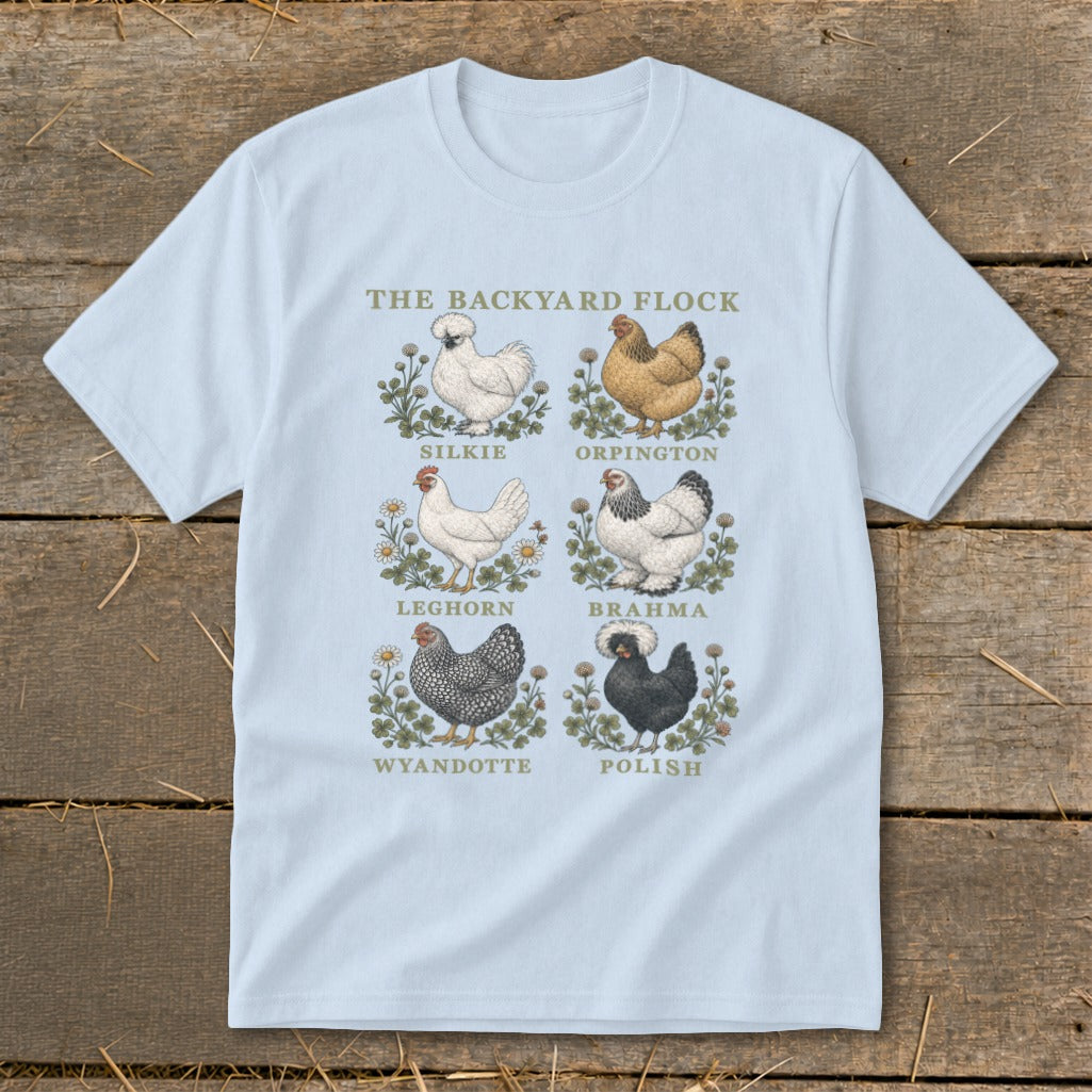 Light blue t-shirt featuring "The Backyard Flock" title and six chicken breeds.