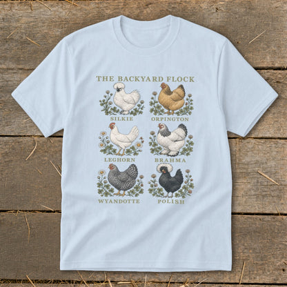 Light blue t-shirt featuring "The Backyard Flock" title and six chicken breeds.