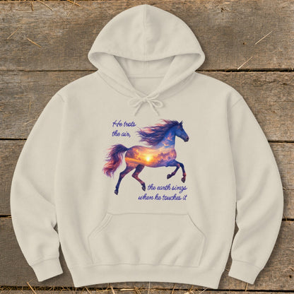 Cream-colored hooded sweatshirt featuring a graphic of a running horse filled with a sunset sky and text.