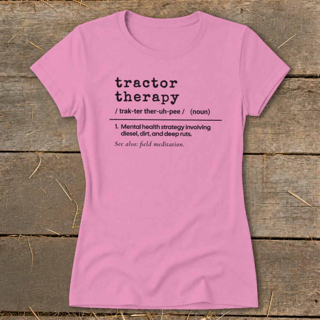 Pink t-shirt with "tractor therapy" definition: mental health strategy involving diesel, dirt, deep ruts.
