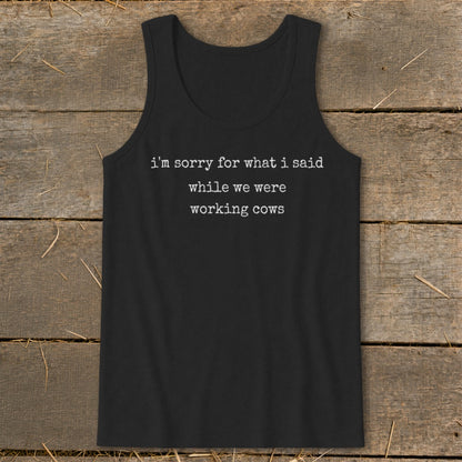 Black tank top with text "I'm sorry for what I said while we were working cows".