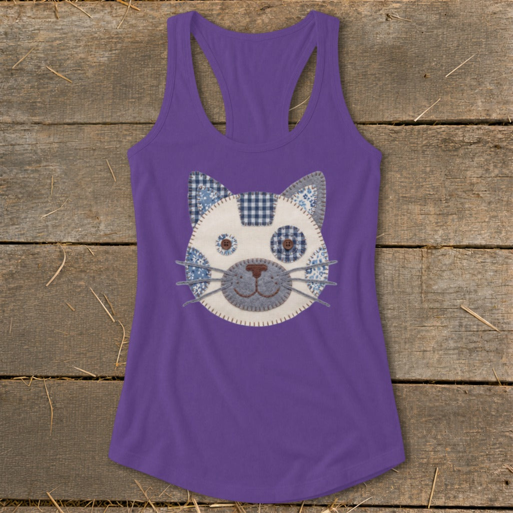 Purple tank top with a patchwork cat face design.