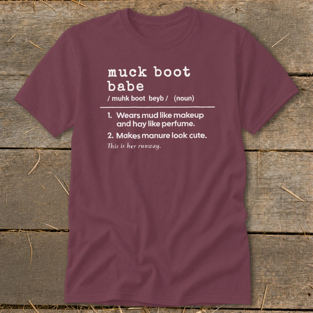 Maroon t-shirt with "muck boot babe" definition and definitions.